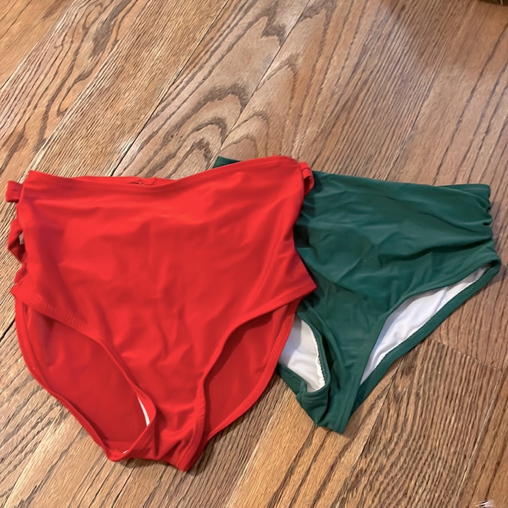 Both are size small, red and green bathing suit bottoms, worn once